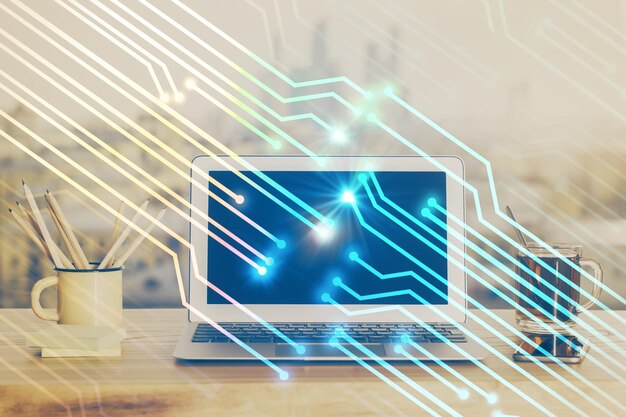 Doble exposición de computadora portátil y holograma temático de tecnología Concepto de trabajo independiente
