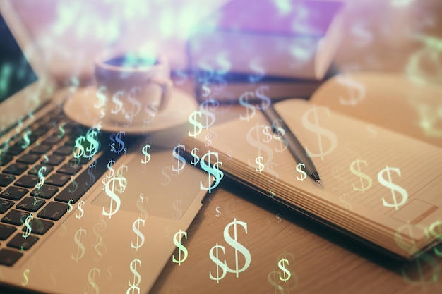 Doble exposición del dibujo de gráficos financieros y el escritorio con café y artículos en el fondo de la mesa Concepto de negociación en el mercado de divisas