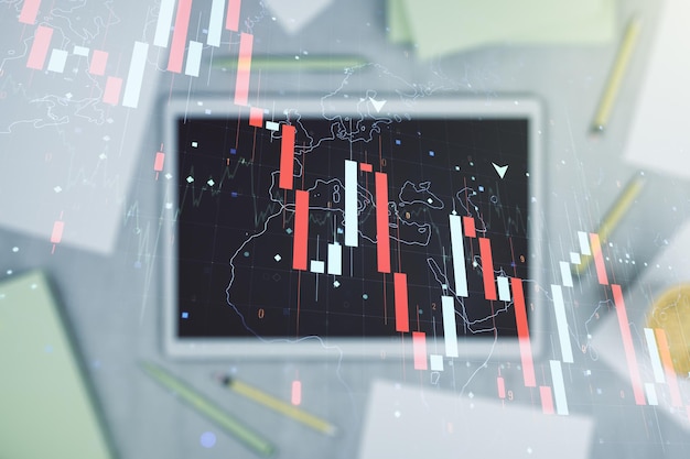 Doble exposición de gráfico de crisis global abstracto creativo con holograma de mapa mundial y tableta digital en la vista superior de fondo Concepto de crisis financiera y recesión