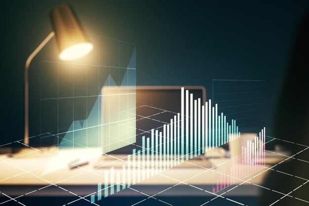 Doble exposición del gráfico financiero creativo abstracto sobre el concepto de estrategia e investigación de antecedentes de portátiles modernos