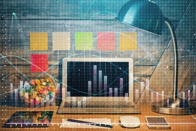 Doble exposición del gráfico forex y espacio de trabajo con computadora Concepto de comercio internacional en línea