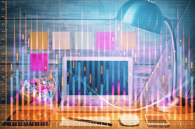Doble exposición del gráfico forex y espacio de trabajo con computadora Concepto de comercio internacional en línea