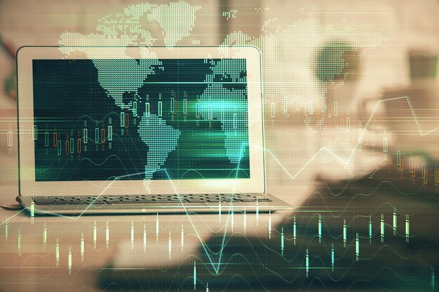 Doble exposición del gráfico forex y espacio de trabajo con computadora Concepto de comercio internacional en línea