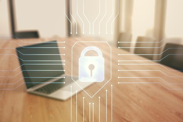 Doble exposición del holograma de bloqueo creativo con chip en el fondo del portátil Concepto de seguridad de la información