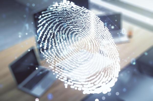 Doble exposición de holograma creativo abstracto de huellas dactilares y escritorio moderno con computadora en la protección de fondo del concepto de información personal
