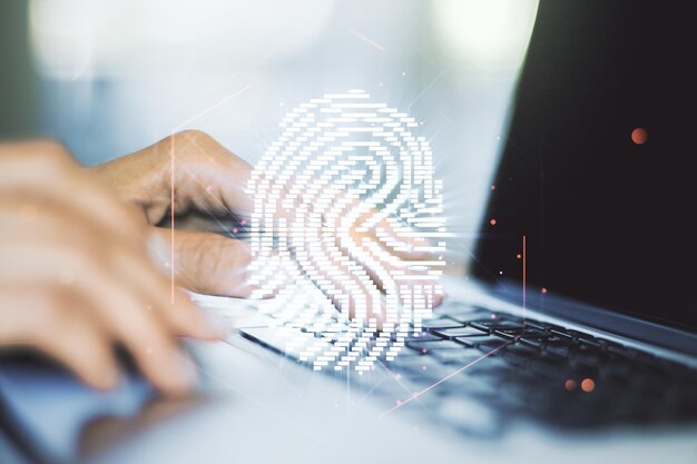 Doble exposición del holograma creativo abstracto de huellas dactilares con las manos escribiendo en una computadora portátil sobre el concepto de investigación y desarrollo de fondo
