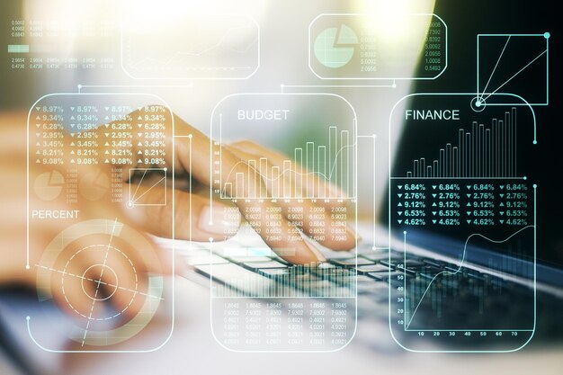 Doble exposición del holograma de datos estadísticos creativos abstractos con las manos escribiendo en una computadora portátil sobre estadísticas de fondo y concepto de análisis