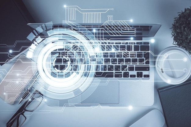 Doble exposición del holograma de dibujo del tema de datos sobre el fondo de la mesa de trabajo de vista superior con concepto de tecnología de computadora