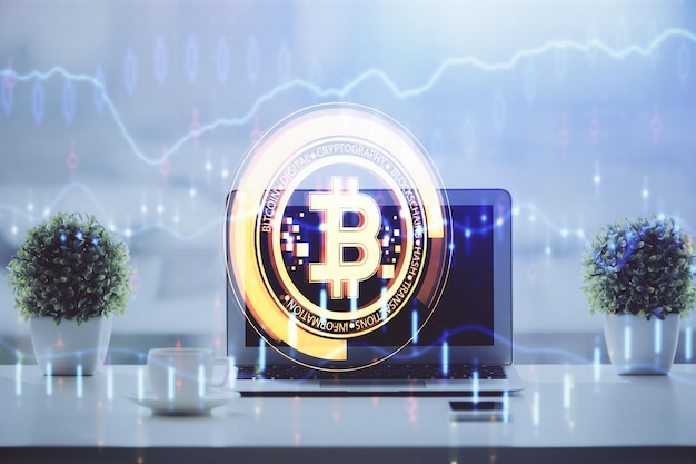 Doble exposición del holograma temático blockchain y criptoeconomía y mesa con fondo de computadora Concepto de criptomoneda bitcoin