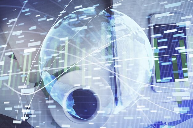 Doble exposición del holograma temático de negocios en el escritorio con teléfono Vista superior Concepto de conexión de comercio internacional móvil