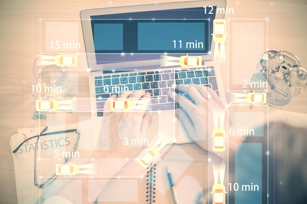 Doble exposición de las manos de los hombres escribiendo sobre el teclado de la computadora y el tema del automóvil dibujando un holograma Vista superior Concepto tecnológico