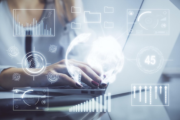 Doble exposición de manos de mujer escribiendo en computadora y gráfico financiero holograma dibujo concepto de análisis del mercado de valores
