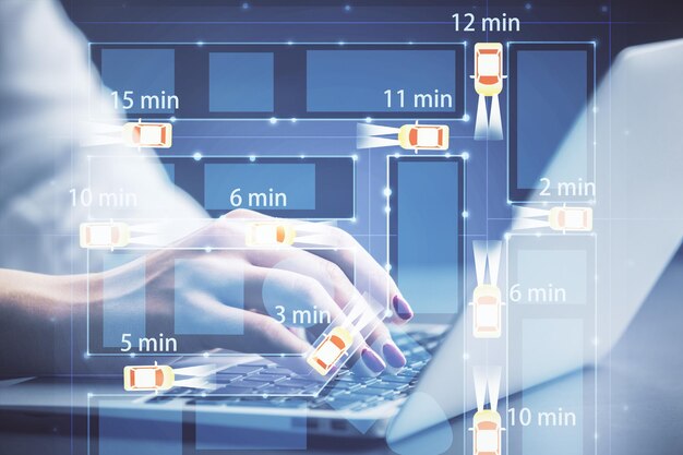 Doble exposición de las manos de la mujer escribiendo en el tema de la computadora y el automóvil dibujando el concepto de alta tecnología