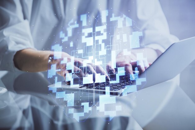 Doble exposición de manos de mujeres trabajando en computadora y dibujo de hologramas de temas de datos Concepto técnico