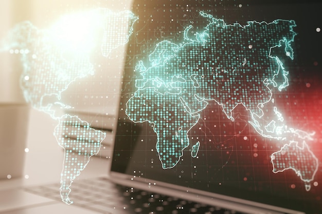 Doble exposición del mapa mundial digital abstracto sobre el concepto de estrategia e investigación de antecedentes de portátiles