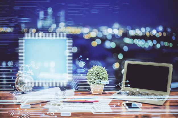 Doble exposición de la mesa con la computadora en el fondo y el concepto de tecnología de datos del holograma del tema de los datos