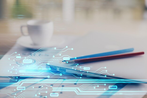 Doble exposición de la mesa con la computadora en el fondo y el concepto de tecnología de datos del holograma del tema de los datos