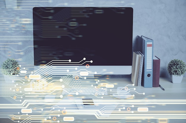 Doble exposición de la mesa con la computadora en el fondo y el concepto de tecnología de datos del holograma del tema de los datos