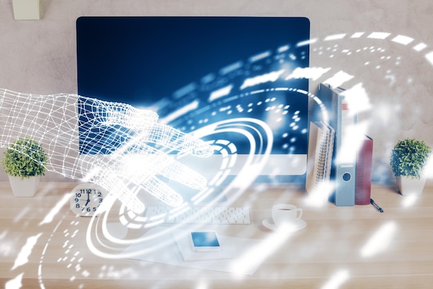 Doble exposición de la mesa con la computadora en el fondo y el concepto de tecnología de datos del holograma del tema de los datos