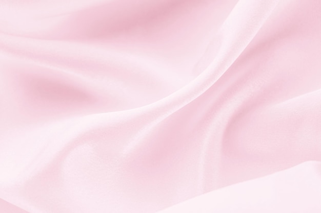 dobras de fundo de textura de tecido de seda rosa