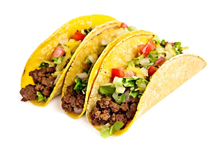 Foto dois tacos com um taco ao lado