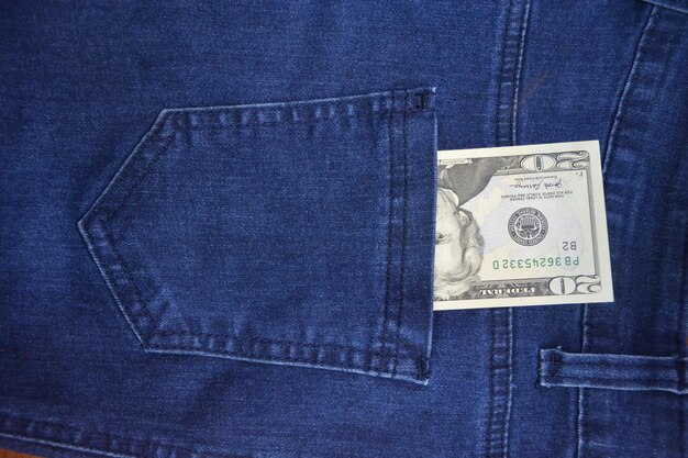 Foto dollar geld in jeans taschengeschäft