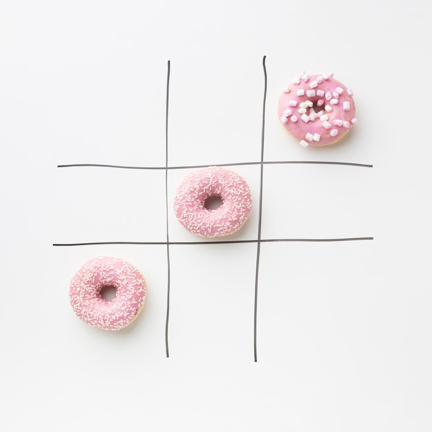 Foto donuts con concepto de tic tac toe