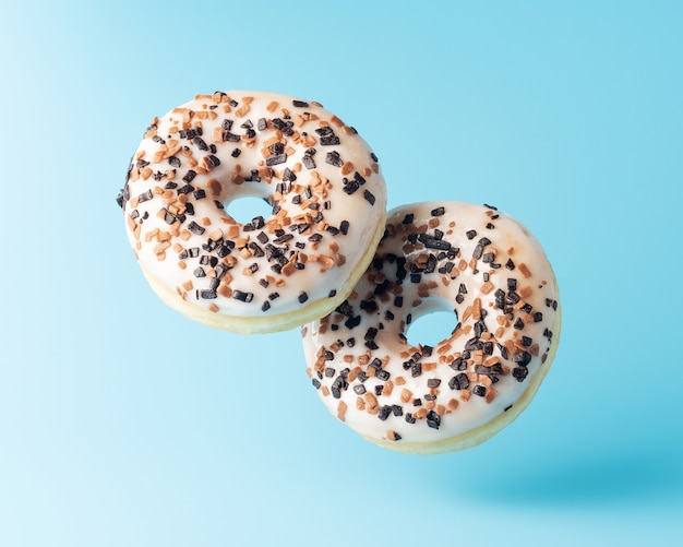 Donuts frescos em fundo azul