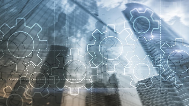 Foto doppelbelichtungsgetriebemechanismus auf verschwommenem hintergrund geschäfts- und industrieprozessautomatisierungskonzept