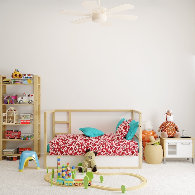 Dormitorio de bebé con juguetes frente a la pared blanca.