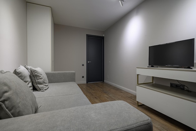 Dormitorio gris de lujo con detalles elegantes y modernos