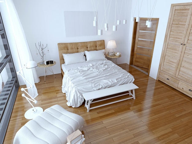 Dormitorio moderno con cama marrón y pared blanca.