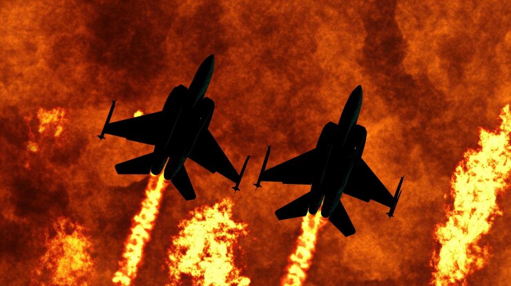 Foto dos aviones de combate vuelan a través del fuego y el humo.