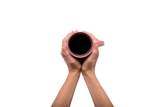 Dos manos sosteniendo una taza con café caliente sobre fondo blanco aislado. Concepto de desayuno con café o té. Buenos días, noches, insomnio. Vista plana, vista superior