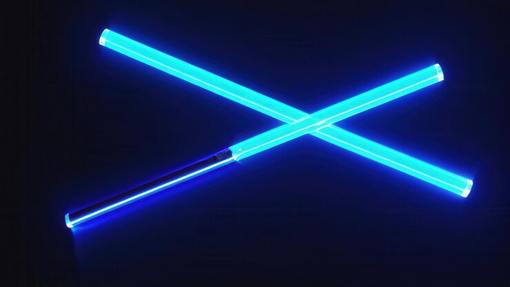 Foto dos sables de luz azules cruzados contra un fondo oscuro