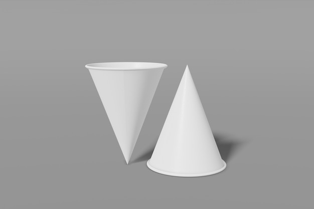 Dos vasos de papel en forma de cono sobre un fondo gris