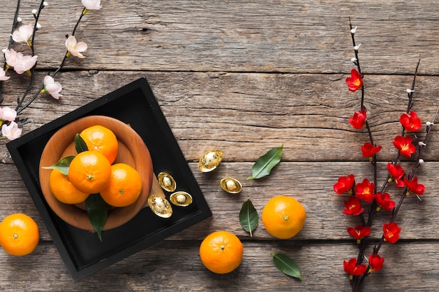 Foto draufsicht des chinesischen neujahrskonzepts auf holztisch