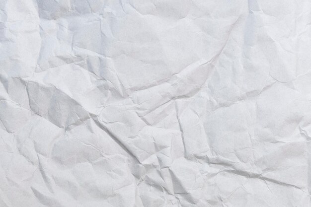 Draufsicht des zerbröckelten Papiers Nahaufnahme des zerknitterten Blattes des weißen Papiers Draufsicht strukturierter Papierhintergrund