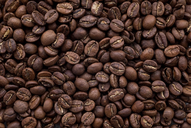 Draufsicht mittel gerösteter Arabica-Kaffeebohne Hintergrund