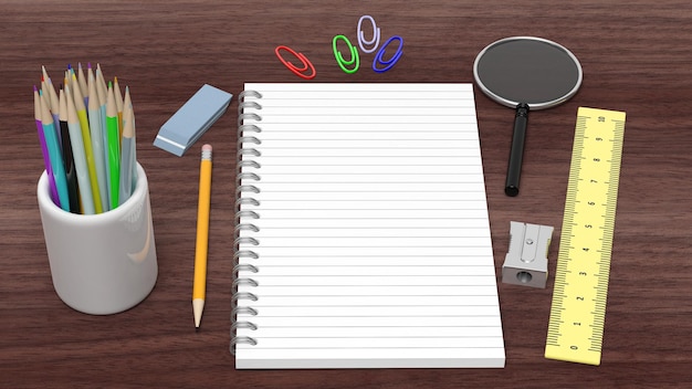 Drawingwriting-Werkzeuge und leerer Notizblock auf hölzernem Schreibtisch