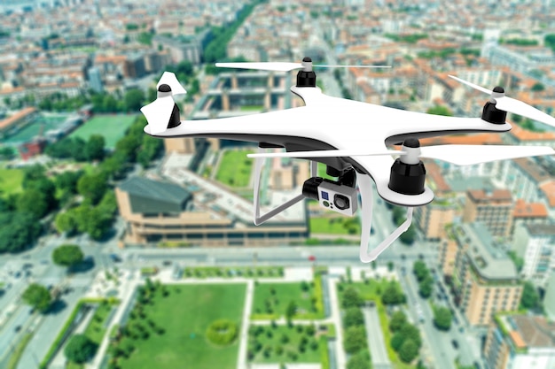 Drone con cámara digital sobrevolando una ciudad