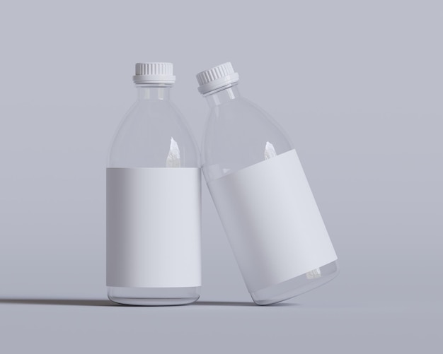 duas garrafas de líquido branco estão sentadas em uma mesa