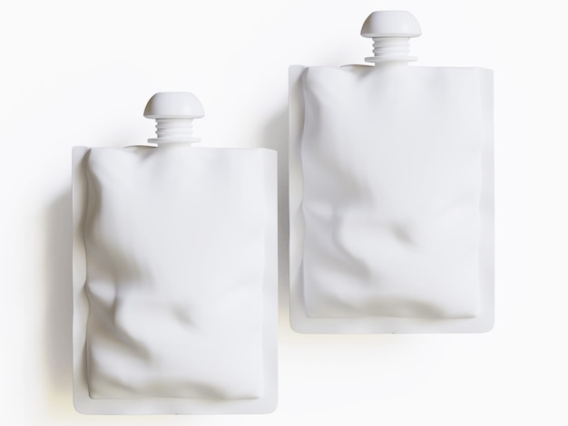 Duas garrafas de perfume estão umas ao lado das outras.