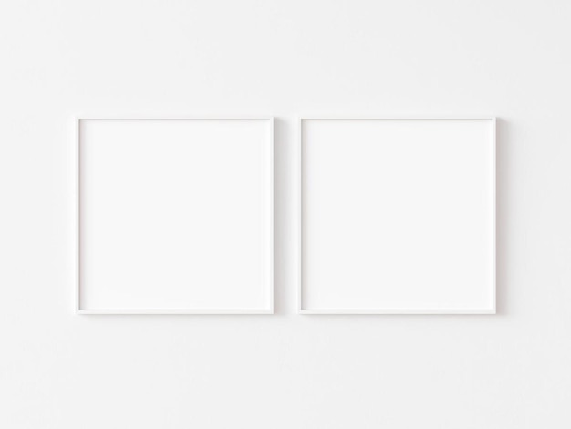 Foto duas molduras quadradas em branco com borda branca fina pendurada na parede branca ilustração 3d