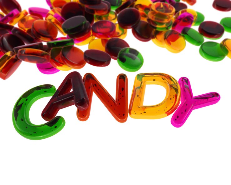 Foto dulces coloridos que forman la palabra caramelo