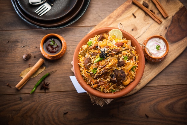 Dum Handi MuttonÃÂÃÂ BiryaniÃÂÃÂ or gosht pilaf is prepared in an earthen or clay pot called Haandi or 1 kilo size. Popular Indian non vegetarian foodÃÂÃÂ 