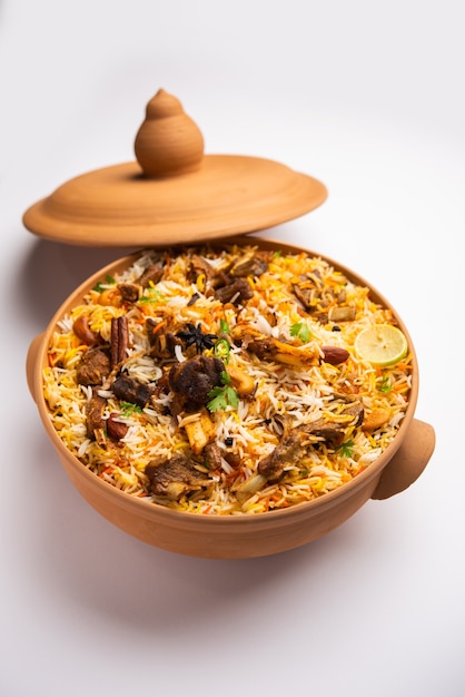 Dum Handi MuttonÃÂÃÂ BiryaniÃÂÃÂ or gosht pilaf is prepared in an earthen or clay pot called Haandi or 1 kilo size. Popular Indian non vegetarian foodÃÂÃÂ 