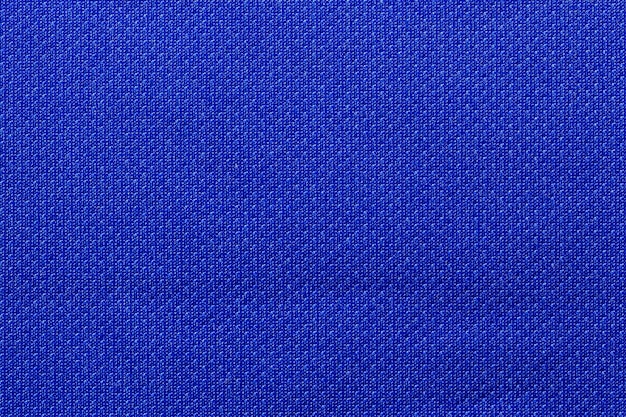 Dunkelblaue Farbe Sportbekleidung Stoff Fußballtrikot Jersey Textur und Textilhintergrund.