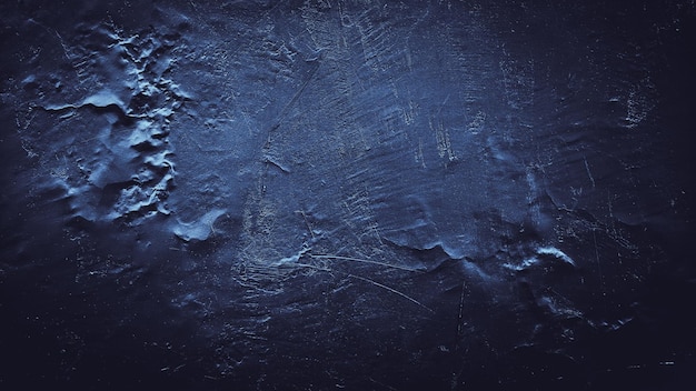 dunkelblauer abstrakter Zementbetonwandbeschaffenheitshintergrund