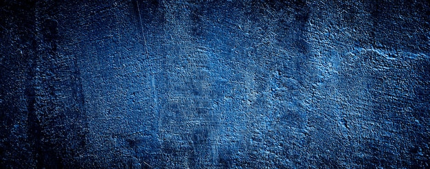 dunkelblauer grungy abstrakter zementbetonwandbeschaffenheitshintergrund